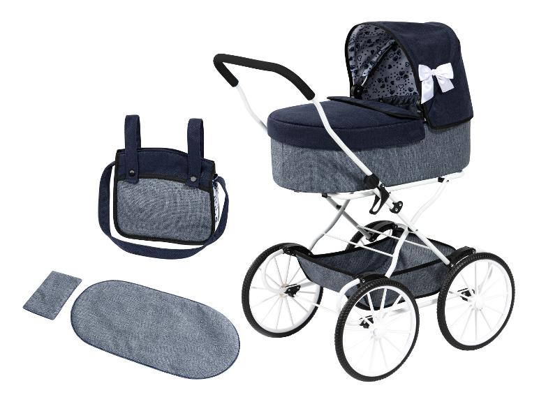 Poussette de poupée bleue avec accessoires, dont un sac et un matelas.