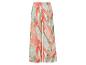 Pantalon large à imprimé floral corail et vert.