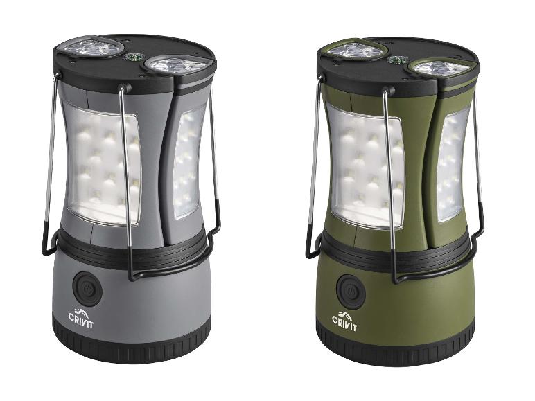 Deux lanternes de camping LED grises et vert olive, avec poignées et boussoles intégrées.