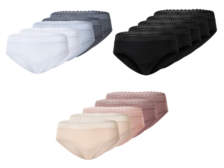 Un ensemble de trois paires de culottes noires, blanches et beiges avec dentelle.