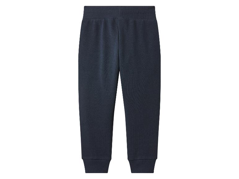 Pantalon de jogging bleu foncé avec taille et poignets côtelés.