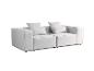 Canapé modulaire gris clair avec coussins sur fond blanc