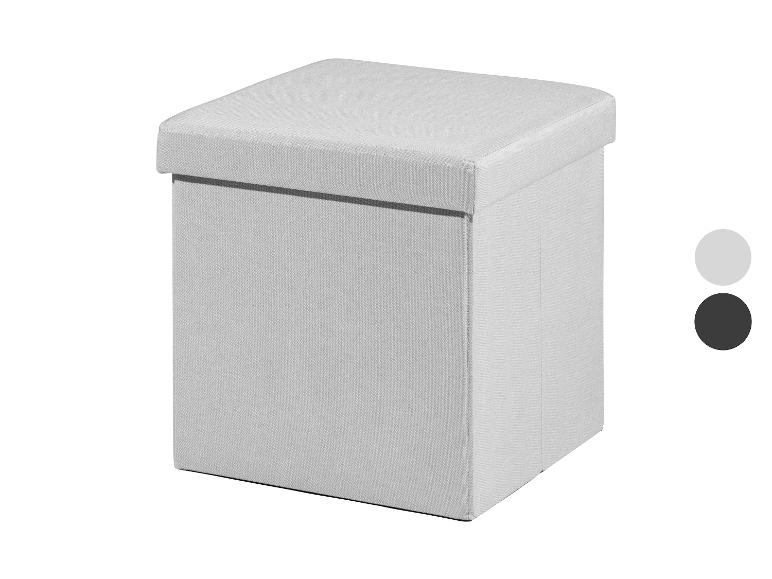 Pouf coffre gris clair, également disponible en noir.
