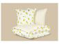 Parure de lit avec motif citrons et rayures jaunes.