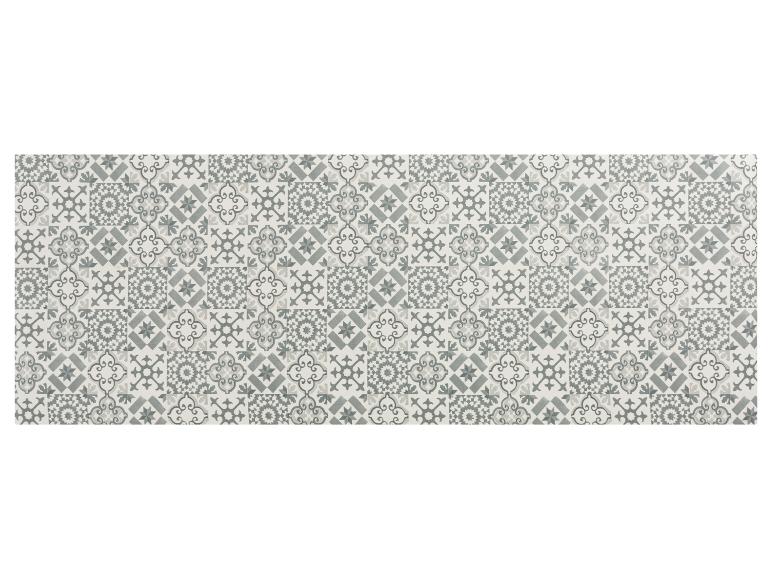 Carreaux gris et blancs avec des motifs géométriques