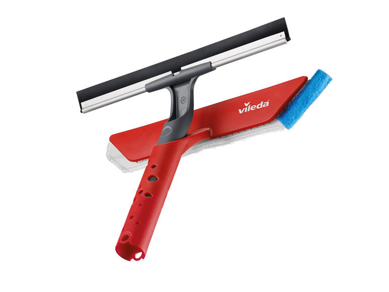 Un nettoyeur de vitres Vileda rouge avec une éponge bleue.