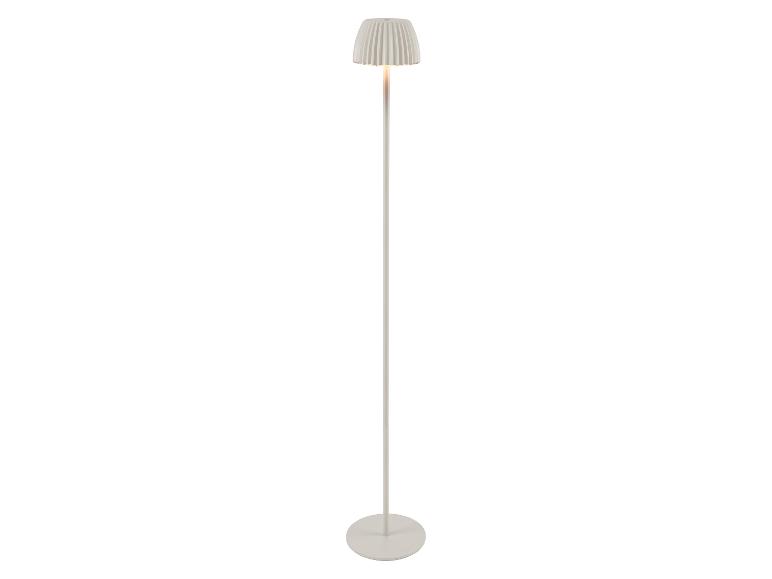 Lampadaire blanc avec un abat-jour plissé et une lumière chaude