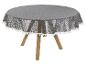 Nappe ronde grise à franges, style bohème.