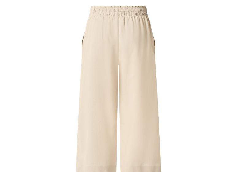 Pantalon large beige avec taille élastique et poches