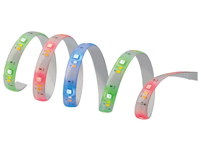 Bande LED flexible et multicolore avec lumière verte, rouge et bleue.