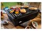 Grillades de poulet et brochettes de légumes sur un grill GrillMeister.