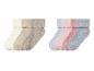 Six paires de chaussettes en différentes couleurs et matières.