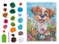 Kit de peinture au diamant : adorable chiot dans un pré fleuri.