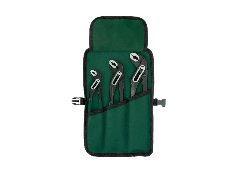 Ensemble de trois pinces noires dans une trousse à outils verte.