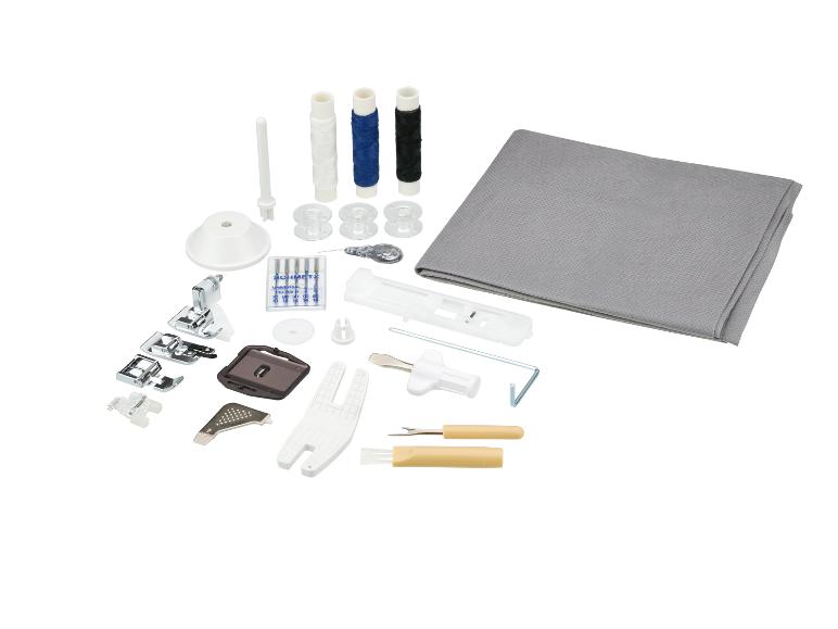 Kit d'accessoires de couture avec fils, aiguilles, pieds-de-biche et outils divers.