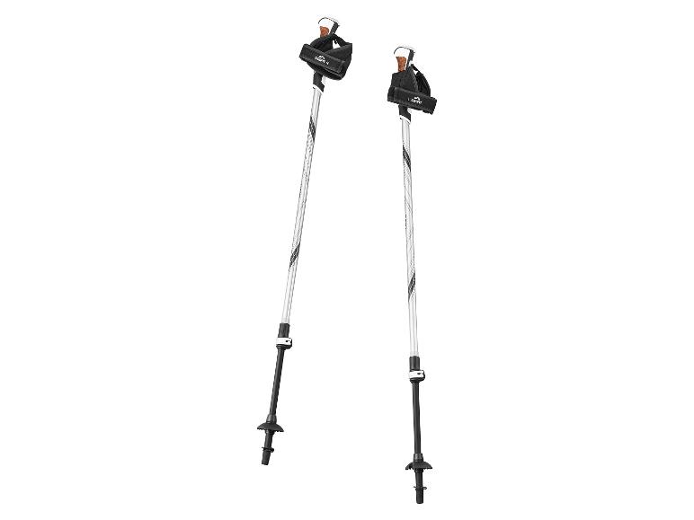 Deux bâtons de trekking Crivit blancs et noirs avec poignées en liège et sangles.