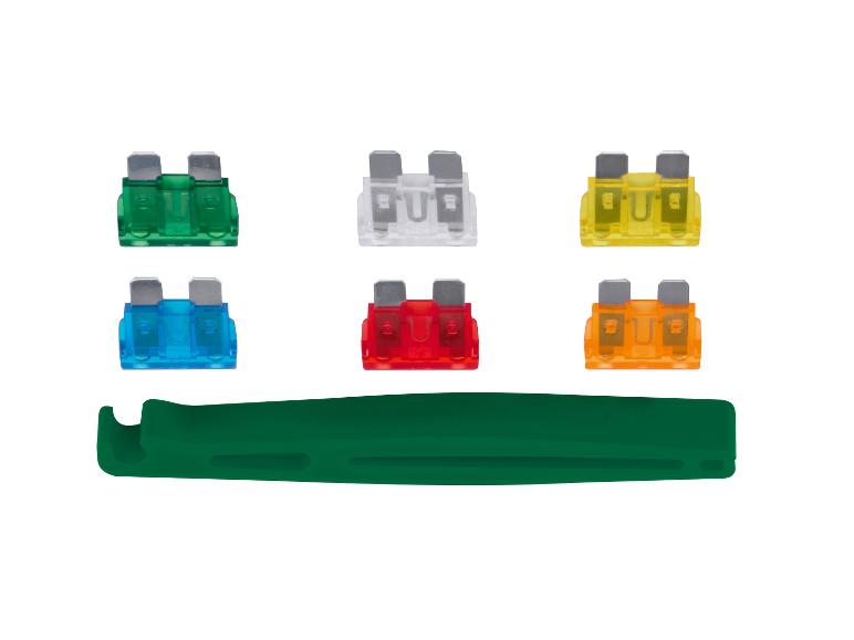 Fusibles de différentes couleurs avec une pince verte.