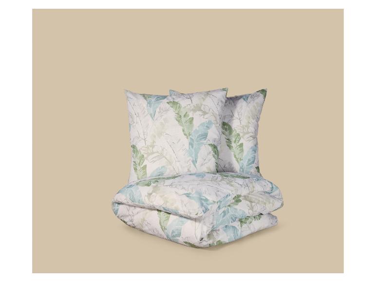 Parure de lit avec motif de feuilles dans des tons verts et bleus.