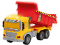 Camion benne jouet jaune et rouge avec lumières allumées et panneaux d'avertissement.