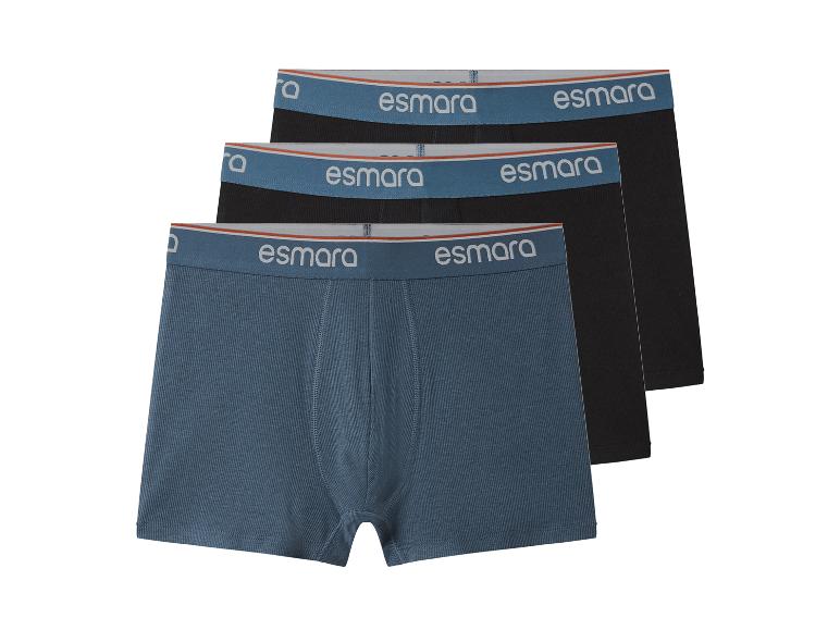 Trois boxers pour hommes, un bleu et deux noirs, avec la marque esmara sur la ceinture.
