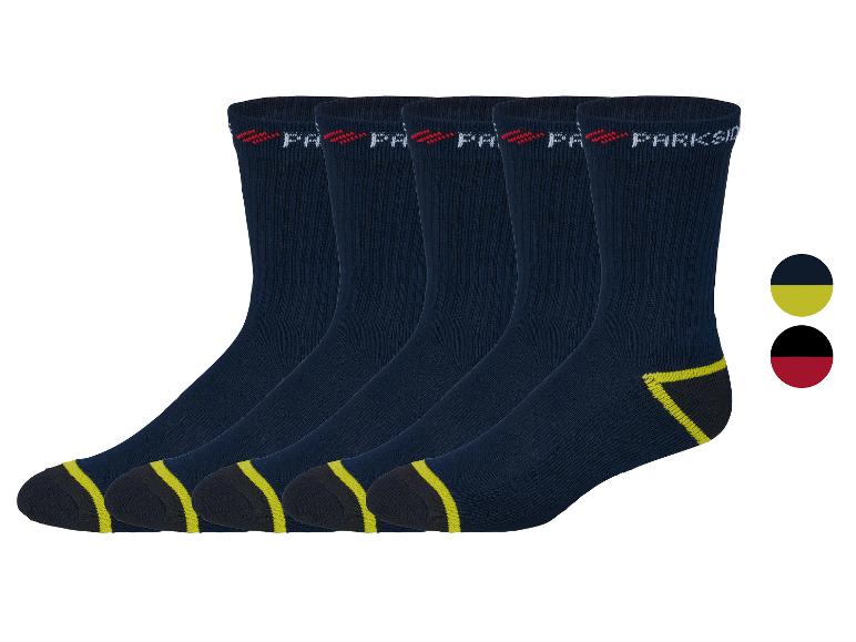 Cinq paires de chaussettes Parkside bleu marine avec des détails jaunes.