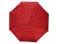 Parapluie rouge avec un motif géométrique de cercles, demi-cercles, triangles et carrés.