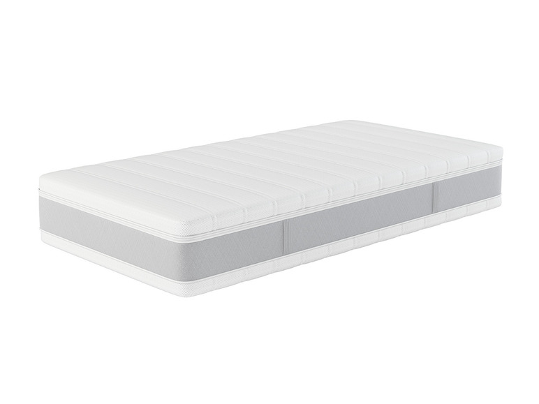 Un matelas blanc avec un bord gris.