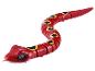 Un jouet de serpent rouge à remonter.