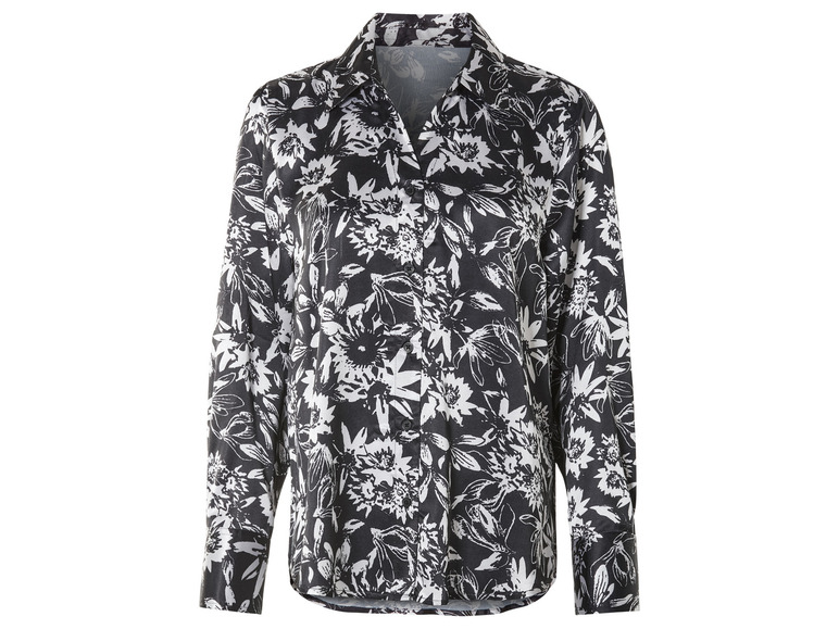 Une chemise noire à manches longues avec un imprimé floral blanc.