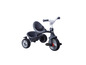 Un tricycle Moby gris avec un compartiment de rangement et un siège.