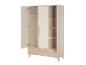Armoire à deux portes, étagères et un tiroir, dans des tons crème et bois clair.