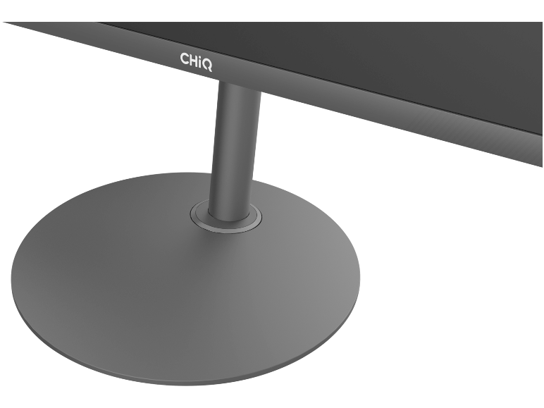 Gros plan sur le socle rond et le pied d'un moniteur noir.
