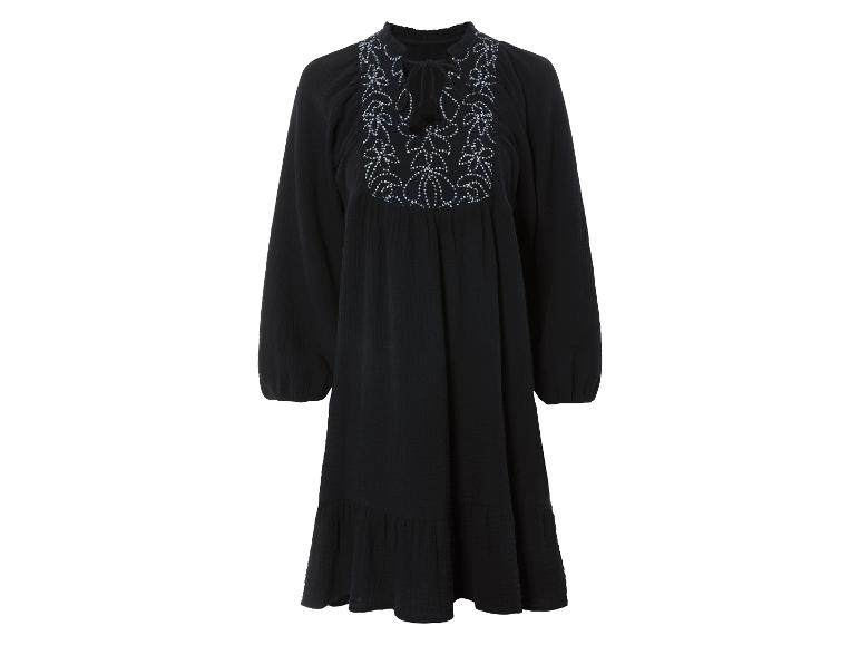 Robe noire à manches longues, style bohème, avec broderie et détails perlés.