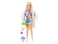Poupée Barbie aux longs cheveux blonds, motif floral et accessoires.