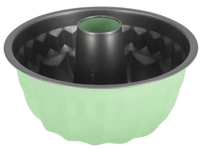 Moule à gâteau Bundt vert et gris avec un motif géométrique à l'intérieur.