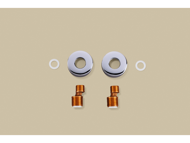 Deux rosaces chromées et deux raccords en laiton avec joints blancs.