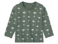 T-shirt vert à manches longues pour bébé, avec un imprimé de visages de ratons laveurs.