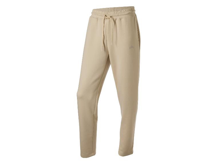 Pantalon de jogging beige pour homme avec taille élastique et cordon de serrage.