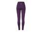 Leggings de sport violets avec une poche zippée à l'arrière.