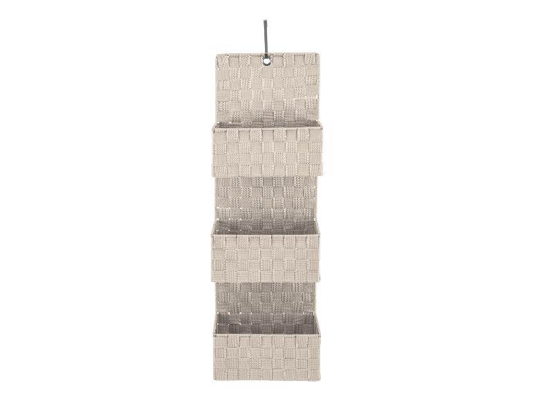 Rangement mural : trois paniers tressés beige.