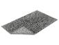 Tapis de bain gris texturé, doux et absorbant.