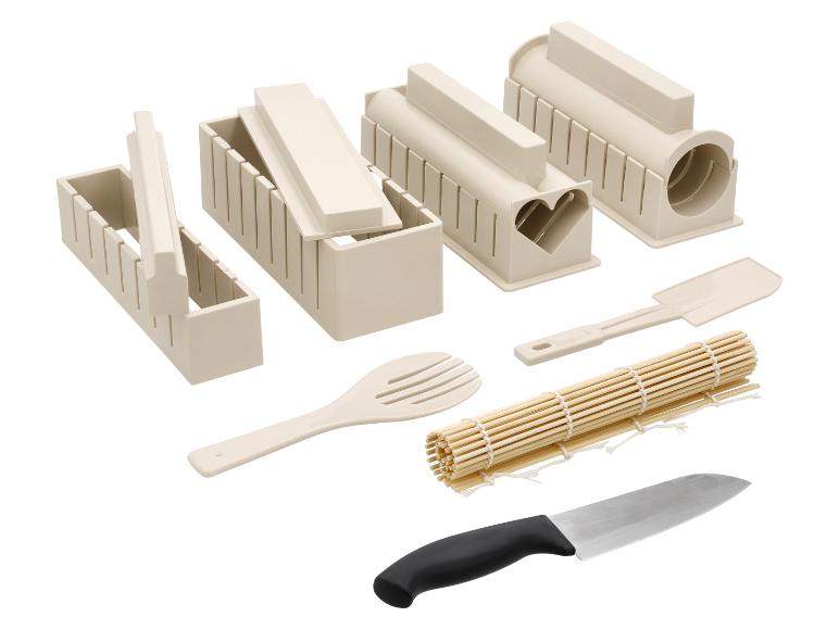 Kit de fabrication de sushis avec moules, tapis en bambou, spatule et couteau.
