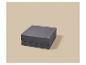Matelas gris pliable sur fond beige.