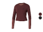 T-shirt de sport pour femme à manches longues, disponible en deux couleurs.