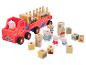 Jouet en bois Peppa Pig, un bus rouge avec des blocs de tri et des figurines.