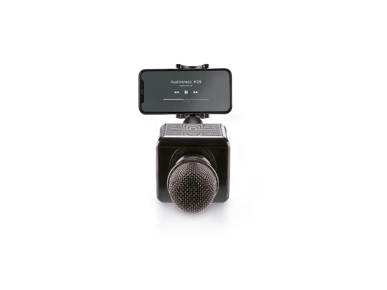 Un microphone sans fil noir avec un smartphone qui joue de la musique.