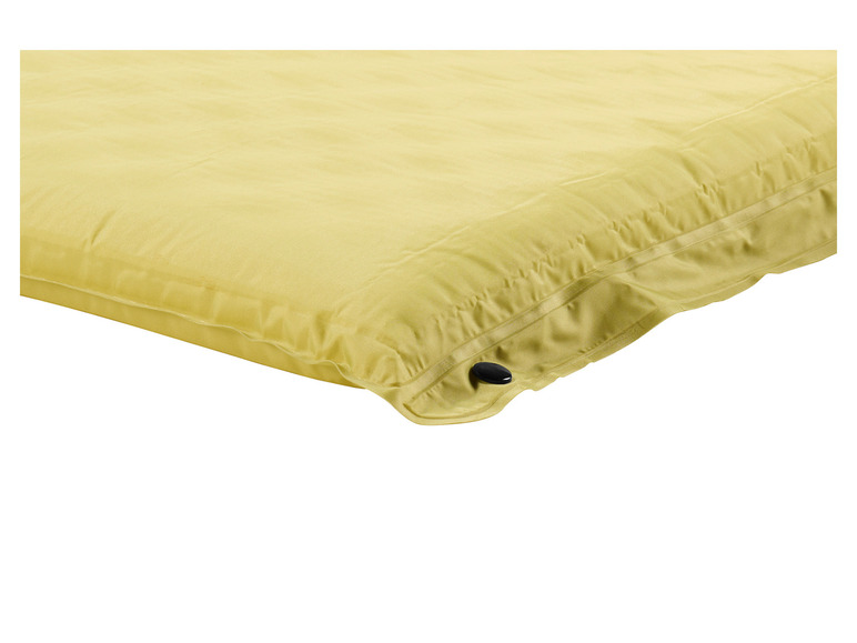 Un matelas pneumatique jaune clair avec un bouton de valve noir.