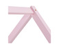 Les pièces en bois rose d'un lit d'enfant.