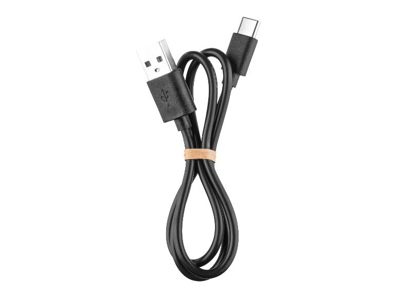 Câble USB-A vers USB-C noir enroulé avec un élastique.