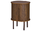 Meuble rond en bois marron avec portes à lattes et pieds coniques.